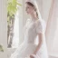 Illusion Champagne La Mariée Robe De Mariée 2021 Princesse Transparentes Encolure Dégagée Gonflée Manches Courtes Dos Nu Appliques En Dentelle Perlage Tribunal Train Volants