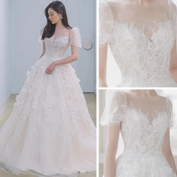 Illusion Champagne La Mariée Robe De Mariée 2021 Princesse Transparentes Encolure Dégagée Gonflée Manches Courtes Dos Nu Appliques En Dentelle Perlage Tribunal Train Volants