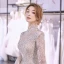 Charmant Champagner Durchsichtige Hochzeits Brautkleider / Hochzeitskleider 2021 Ballkleid Stehkragen Lange Ärmel Rückenfreies Applikationen Spitze Perlenstickerei Pailletten Glanz Tülle Kathedrale Schleppe Rüschen