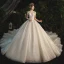 Glitzernden Champagner Durchsichtige Hochzeits Brautkleider / Hochzeitskleider 2021 Ballkleid Rundhalsausschnitt Kurze Ärmel Rückenfreies Perlenstickerei Pailletten Glanz Tülle Kathedrale Schleppe Rüschen
