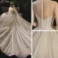 Glitzernden Champagner Durchsichtige Hochzeits Brautkleider / Hochzeitskleider 2021 Ballkleid Rundhalsausschnitt Kurze Ärmel Rückenfreies Perlenstickerei Pailletten Glanz Tülle Kathedrale Schleppe Rüschen