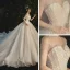 Glitzernden Champagner Durchsichtige Hochzeits Brautkleider / Hochzeitskleider 2021 Ballkleid Rundhalsausschnitt Kurze Ärmel Rückenfreies Perlenstickerei Pailletten Glanz Tülle Kathedrale Schleppe Rüschen