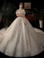 Luxe Champagne Transparentes La Mariée Robe De Mariée 2021 Robe Boule Col Haut Manches Courtes Dos Nu Fait main Perlage Paillettes Glitter Tulle Royal Train Volants
