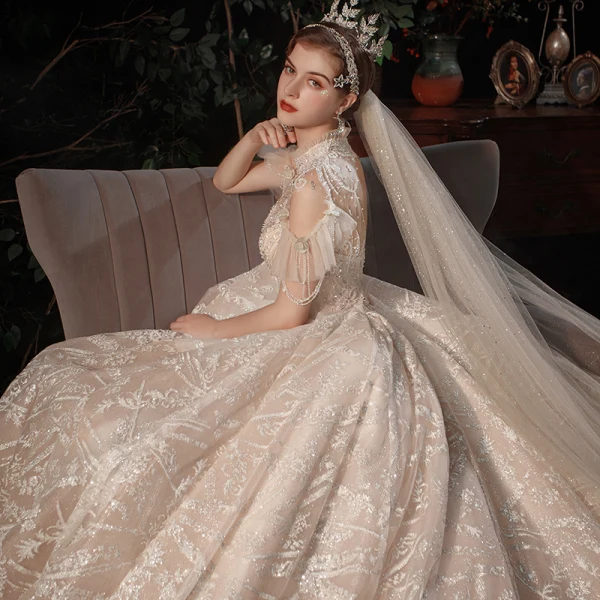 Luxe Champagne Transparentes La Mariée Robe De Mariée 2021 Robe Boule Col Haut Manches Courtes Dos Nu Fait main Perlage Paillettes Glitter Tulle Royal Train Volants