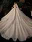 Luxe Champagne Transparentes La Mariée Robe De Mariée 2021 Robe Boule Col Haut Manches Courtes Dos Nu Fait main Perlage Paillettes Glitter Tulle Royal Train Volants