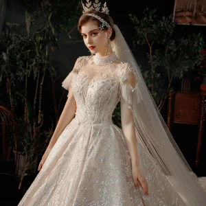 Luxe Champagne Transparentes La Mariée Robe De Mariée 2021 Robe Boule Col Haut Manches Courtes Dos Nu Fait Main Perlage Paillettes Glitter Tulle Royal Train Volants