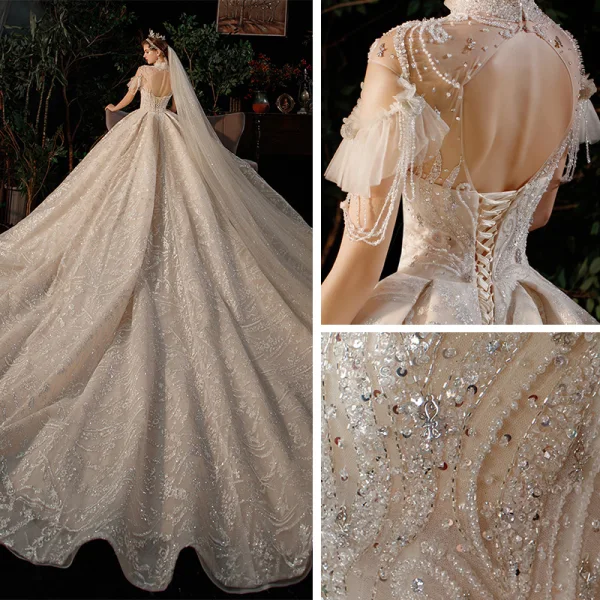 Luxe Champagne Transparentes La Mariée Robe De Mariée 2021 Robe Boule Col Haut Manches Courtes Dos Nu Fait main Perlage Paillettes Glitter Tulle Royal Train Volants