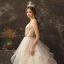 Mode Champagne Bröllopsklänningar 2019 Prinsessa Spaghettiband Ärmlös Halterneck Chapel Train Cascading Volanger