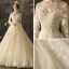 Illusion Champagne Transparentes Robe De Mariée 2019 Princesse Encolure Dégagée 3/4 Manches Dos Nu Appliques En Dentelle Perlage Chapel Train Volants