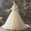 Illusion Champagne Transparentes Robe De Mariée 2019 Princesse Encolure Dégagée Manches de cloche Appliques En Dentelle Perle Glitter Tulle Tribunal Train Volants