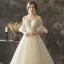 Illusion Champagne Transparentes Robe De Mariée 2019 Princesse Encolure Dégagée Manches de cloche Appliques En Dentelle Perle Glitter Tulle Tribunal Train Volants