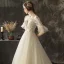 Illusion Champagne Transparentes Robe De Mariée 2019 Princesse Encolure Dégagée Manches de cloche Appliques En Dentelle Perle Glitter Tulle Tribunal Train Volants