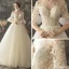 Illusion Champagne Transparentes Robe De Mariée 2019 Princesse Encolure Dégagée Manches de cloche Appliques En Dentelle Perle Glitter Tulle Tribunal Train Volants