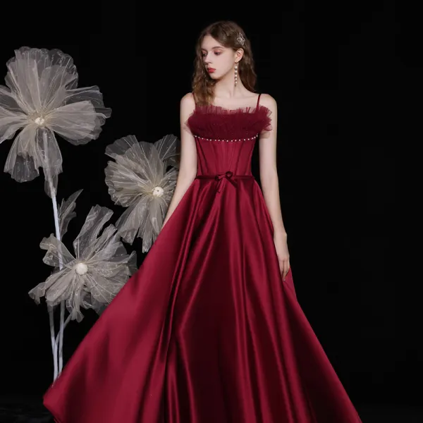 Fashion Burgundy Satin Dancing Prom Dresses 2021 A-Line / Princess Spaghetti Straps Sleeveless Beading Pearl Bow Sash Floor-Length / Long Ruffle Backless Formal Dresses