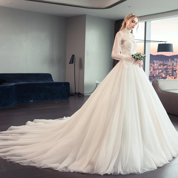 Vintage / Originale Champagne Transparentes Robe De Mariée 2019 Princesse Col Haut Gonflée Manches Longues Perle Perlage Chapel Train Volants