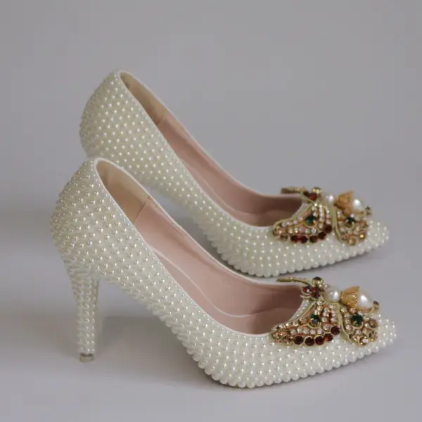 Elegante Abrikoos / Beige Rhinestone Parel Vlinder Bruidsschoenen 2025 9 cm Naaldhakken / Stiletto Spitse Neus Huwelijk Pumps Hoge Hakken
