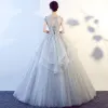 Chic / Beautiful Silver Prom Dresses 2017 Ball Gown Scoop Neck Short Sleeve Appliques Lace Glitter Tulle Floor-Length / Long Ruffle Backless Formal Dresses