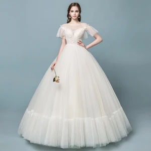 Remise Transparentes Champagne Robe De Mariée 2018 Robe Boule Encolure Carrée Manches Courtes Dos Nu Perle Perlage Appliques En Dentelle Volants Longue
