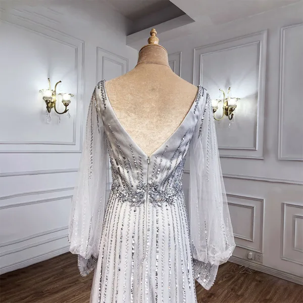 Charmant High End Beige Abendkleider 2021 A Linie V-Ausschnitt Perlenstickerei Strass Pailletten Lange Ärmel Rückenfreies Sweep / Pinsel Zug Abend Festliche Kleider