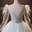 Style Audrey Hepburn Plumes Hiver Manches Longues Robe De Bal 2024 Gris Robe Boule Bretelles croisées Robe De Cérémonie