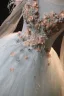 Style Audrey Hepburn Plumes Hiver Manches Longues Robe De Bal 2024 Gris Robe Boule Bretelles croisées Robe De Cérémonie