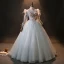 Style Audrey Hepburn Plumes Hiver Manches Longues Robe De Bal 2024 Gris Robe Boule Bretelles croisées Robe De Cérémonie