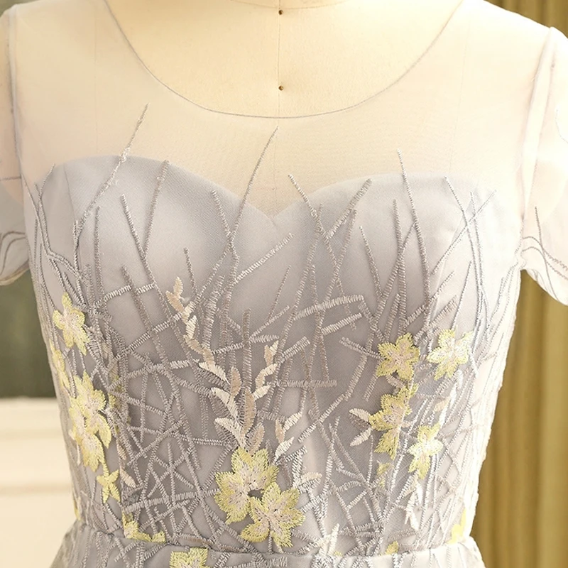Flower Fairy Grey Plus Size Graduation Dresses 2018 A Line Princess Tulle U Neck Appliques Backless Embroidered Homecoming Formal Dresses Flower Fairy Grey Plus Size Graduation Dresses 2018 A Line Princess Tulle U Neck Appliques Backless Embroidered Homecoming Formal Dresses