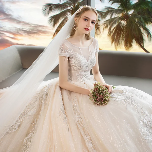Élégant Champagne Transparentes Robe De Mariée 2019 Princesse Encolure Dégagée Mancherons Appliques En Dentelle Perlage Glitter Tulle Cathedral Train Volants