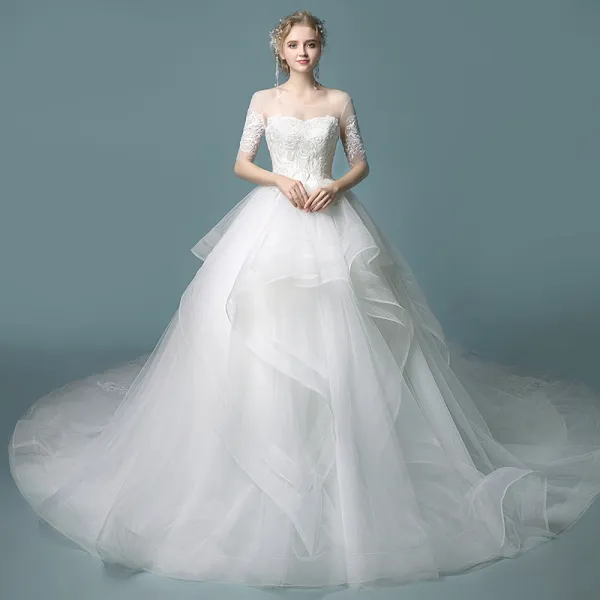 Affordable Ivory See-through Wedding Dresses 2019 Ball Gown Scoop Neck 1/2 Sleeves Backless Appliques Lace Chapel Train Cascading Ruffles