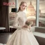 Illusion Champagne Pierced Wedding Dresses 2019 A-Line / Princess High Neck Long Sleeve Backless Appliques Lace Cathedral Train Ruffle