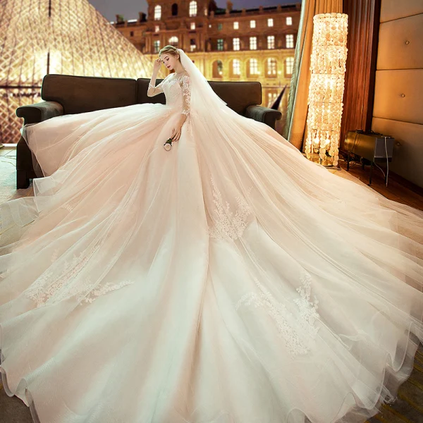 Elegant Champagne See-through Wedding Dresses 2019 A-Line / Princess Scoop Neck 3/4 Sleeve Backless Pierced Appliques Lace Pearl Cathedral Train Ruffle