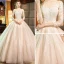 Elegant Champagne See-through Wedding Dresses 2019 A-Line / Princess Scoop Neck 3/4 Sleeve Backless Pierced Appliques Lace Pearl Cathedral Train Ruffle