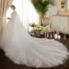 Chinese style Ivory Pierced Wedding Dresses 2019 Ball Gown High Neck Long Sleeve Appliques Lace Glitter Tulle Cathedral Train Ruffle