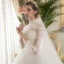 Style Chinois Ivoire Percé Robe De Mariée 2019 Robe Boule Col Haut Manches Longues Appliques En Dentelle Glitter Tulle Cathedral Train Volants