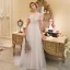 Élégant Champagne Transparentes Robe De Mariée 2019 Princesse Encolure Dégagée Manches Courtes Dos Nu Appliques En Dentelle Perle Train De Balayage Volants