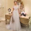 Élégant Champagne Transparentes Robe De Mariée 2019 Princesse Encolure Dégagée Manches Courtes Dos Nu Appliques En Dentelle Perle Train De Balayage Volants