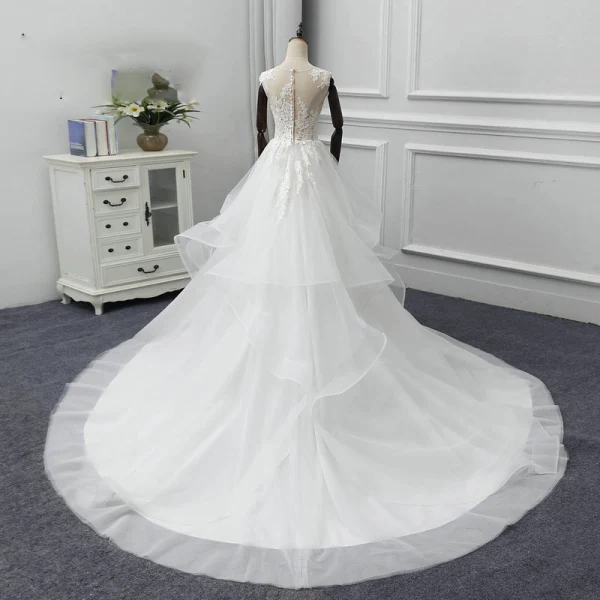 Illusion Ivory See-through Wedding Dresses 2018 A-Line / Princess Scoop Neck Sleeveless Appliques Lace Chapel Train Cascading Ruffles