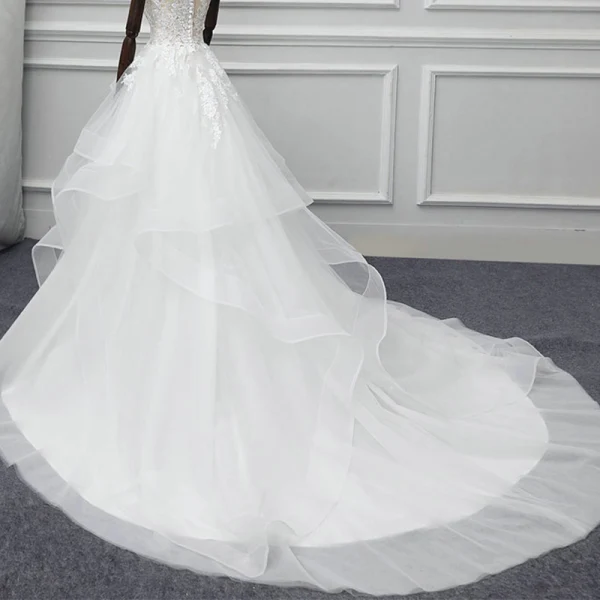 Illusion Ivory See-through Wedding Dresses 2018 A-Line / Princess Scoop Neck Sleeveless Appliques Lace Chapel Train Cascading Ruffles