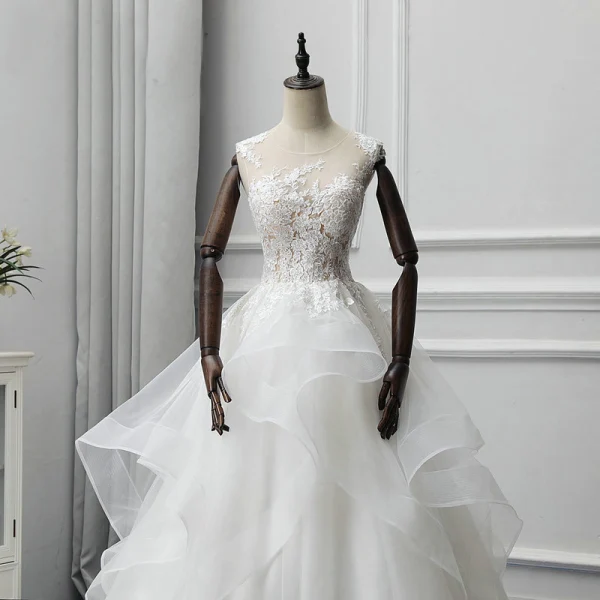 Illusion Ivory See-through Wedding Dresses 2018 A-Line / Princess Scoop Neck Sleeveless Appliques Lace Chapel Train Cascading Ruffles