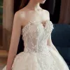 Classy Ivory Wedding Dresses 2019 Ball Gown Sweetheart Sleeveless Backless Appliques Lace Beading Pearl Court Train Ruffle