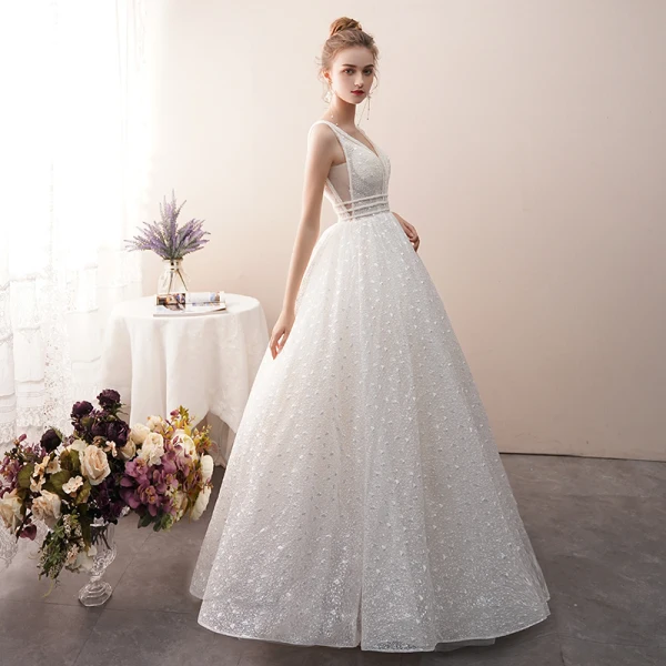 Meilleur Ivoire Transparentes Dentelle Robe De Mariée 2019 Princesse V-Cou Sans Manches Dos Nu Perlage Longue Volants