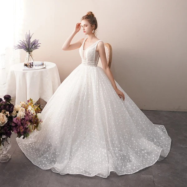 Meilleur Ivoire Transparentes Dentelle Robe De Mariée 2019 Princesse V-Cou Sans Manches Dos Nu Perlage Longue Volants