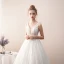 Meilleur Ivoire Transparentes Dentelle Robe De Mariée 2019 Princesse V-Cou Sans Manches Dos Nu Perlage Longue Volants