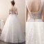 Meilleur Ivoire Transparentes Dentelle Robe De Mariée 2019 Princesse V-Cou Sans Manches Dos Nu Perlage Longue Volants