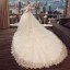 Vintage Ivory Pierced Wedding Dresses 2018 Ball Gown High Neck Short Sleeve Backless Appliques Lace Pearl Beading Tassel Royal Train