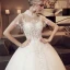 Vintage Ivory Pierced Wedding Dresses 2018 Ball Gown High Neck Short Sleeve Backless Appliques Lace Pearl Beading Tassel Royal Train