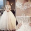 Vintage Ivory Pierced Wedding Dresses 2018 Ball Gown High Neck Short Sleeve Backless Appliques Lace Pearl Beading Tassel Royal Train