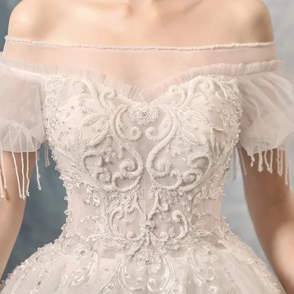 Luxus / Herrlich Ivory / Creme Brautkleider / Hochzeitskleider 2019 A Linie Off Shoulder Geschwollenes Kurze Ärmel Rückenfreies Applikationen Spitze Perlenstickerei Quaste Kapelle-Schleppe Rüschen