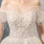 Luxus / Herrlich Ivory / Creme Brautkleider / Hochzeitskleider 2019 A Linie Off Shoulder Geschwollenes Kurze Ärmel Rückenfreies Applikationen Spitze Perlenstickerei Quaste Kapelle-Schleppe Rüschen