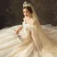 Élégant Champagne Transparentes Robe De Mariée 2019 Princesse Encolure Dégagée Manches Courtes Dos Nu Appliques En Dentelle Glitter Tulle Chapel Train Volants